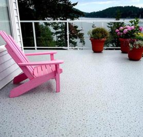 Duradek Supreme Chip Granite Vinyl Decking and Glass Railing with White Posts